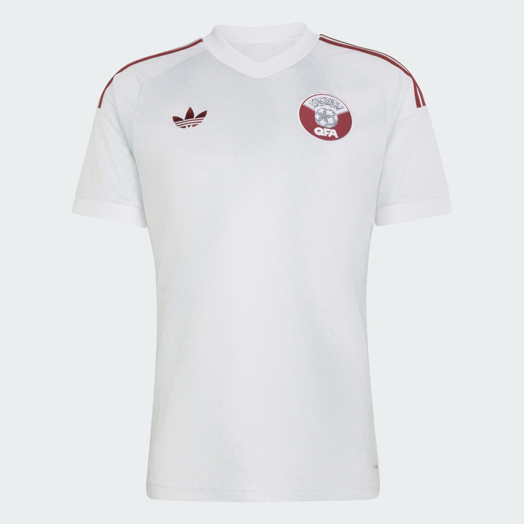 Qatar 2026 World Cup adidas white away jersey with maroon trim and the QFA crest, worn in the Group B match vs Bosnia