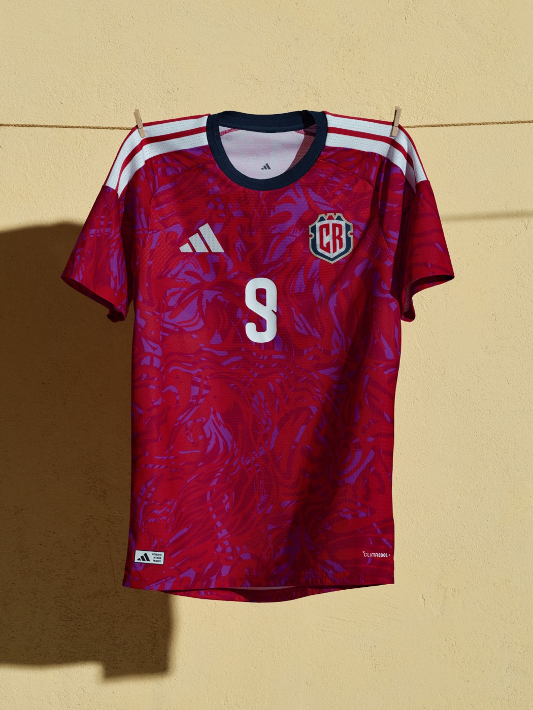 Costa Rica 2026 World Cup home kit by Adidas in red and purple swirl pattern