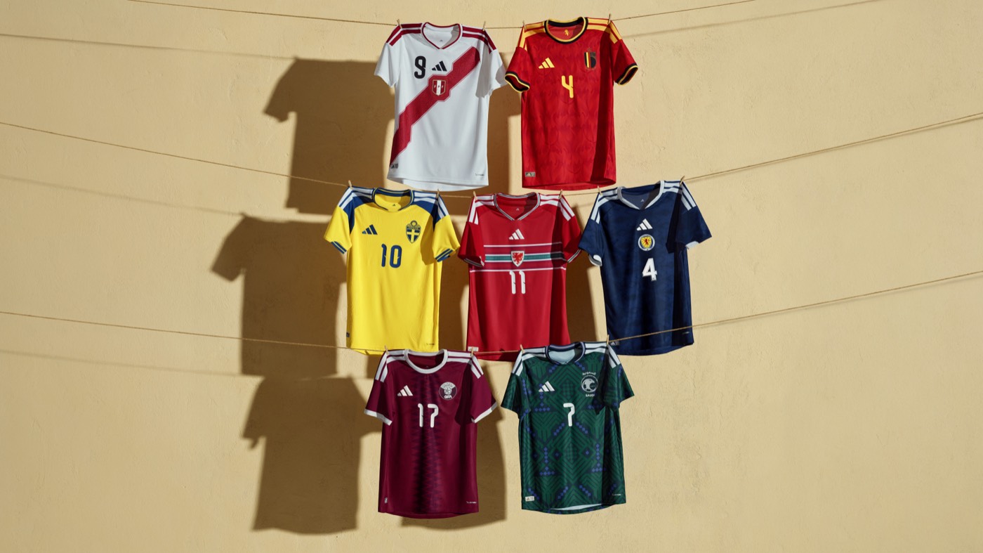 Adidas 2026 World Cup home kits on a clothesline including Peru, Belgium, Sweden, Venezuela, Scotland, Japan, and Mexico