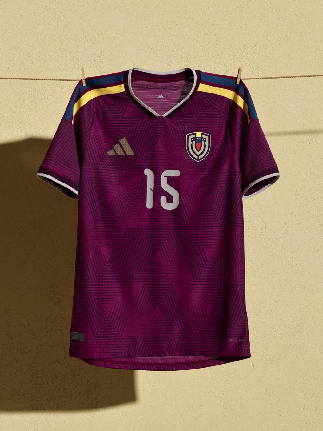 Venezuela 2026 World Cup home kit by Adidas in burgundy with geometric pattern