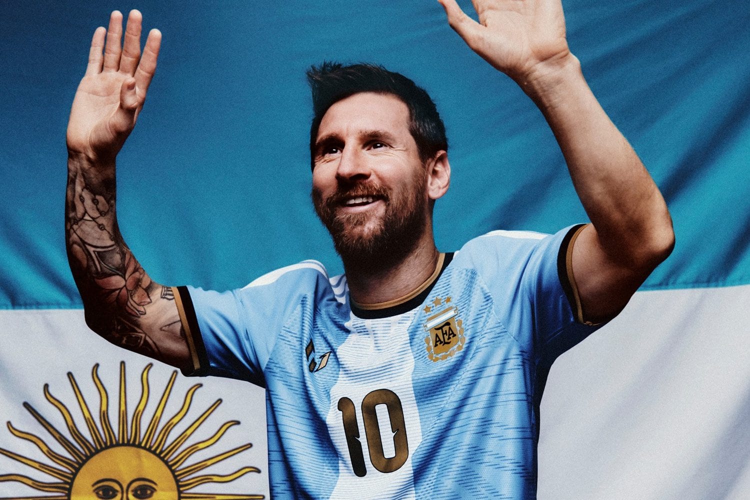 Lionel Messi in the special edition Argentina farewell jersey by adidas: sky blue with one wide white center stripe, black collar with gold trim, gold AFA crest and a gold number 10