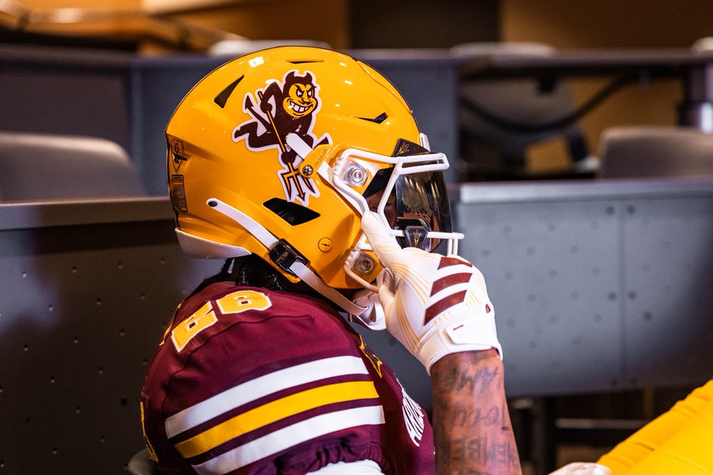 Arizona State 2026 Roses and Devils throwback uniform, a gold helmet with the full body Sparky pitchfork devil decal, white facemask, and a maroon jersey with white and gold shoulder stripes