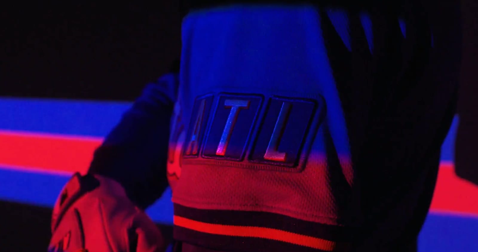 ATL sleeve patch on Braves City Connect jersey styled like TBS logo