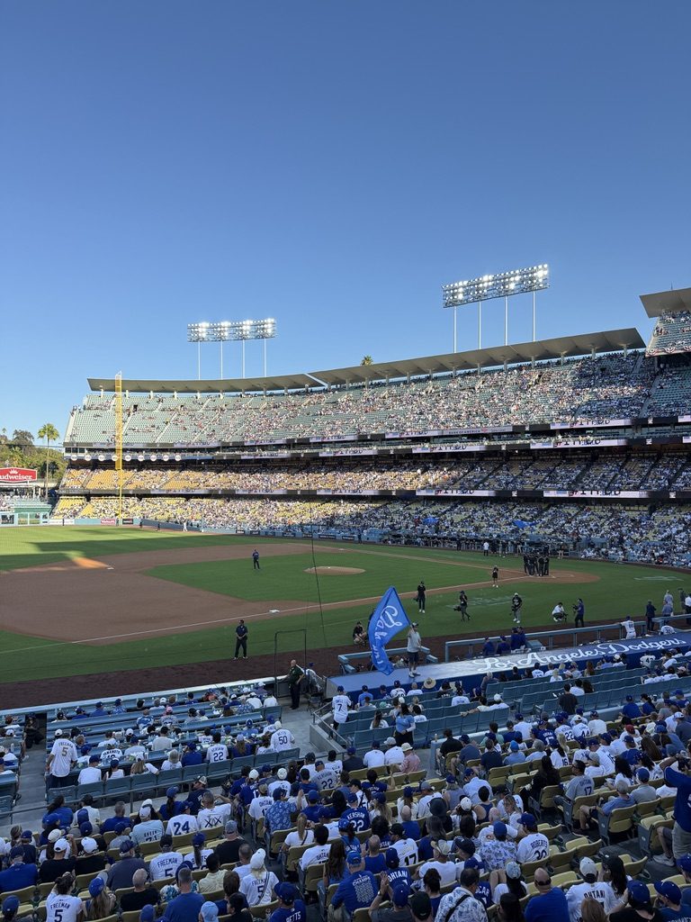 Dodger Stadium a few minutes before first pitch of NLDS Game 2 on October 4 2026, with empty seats still showing in the field level