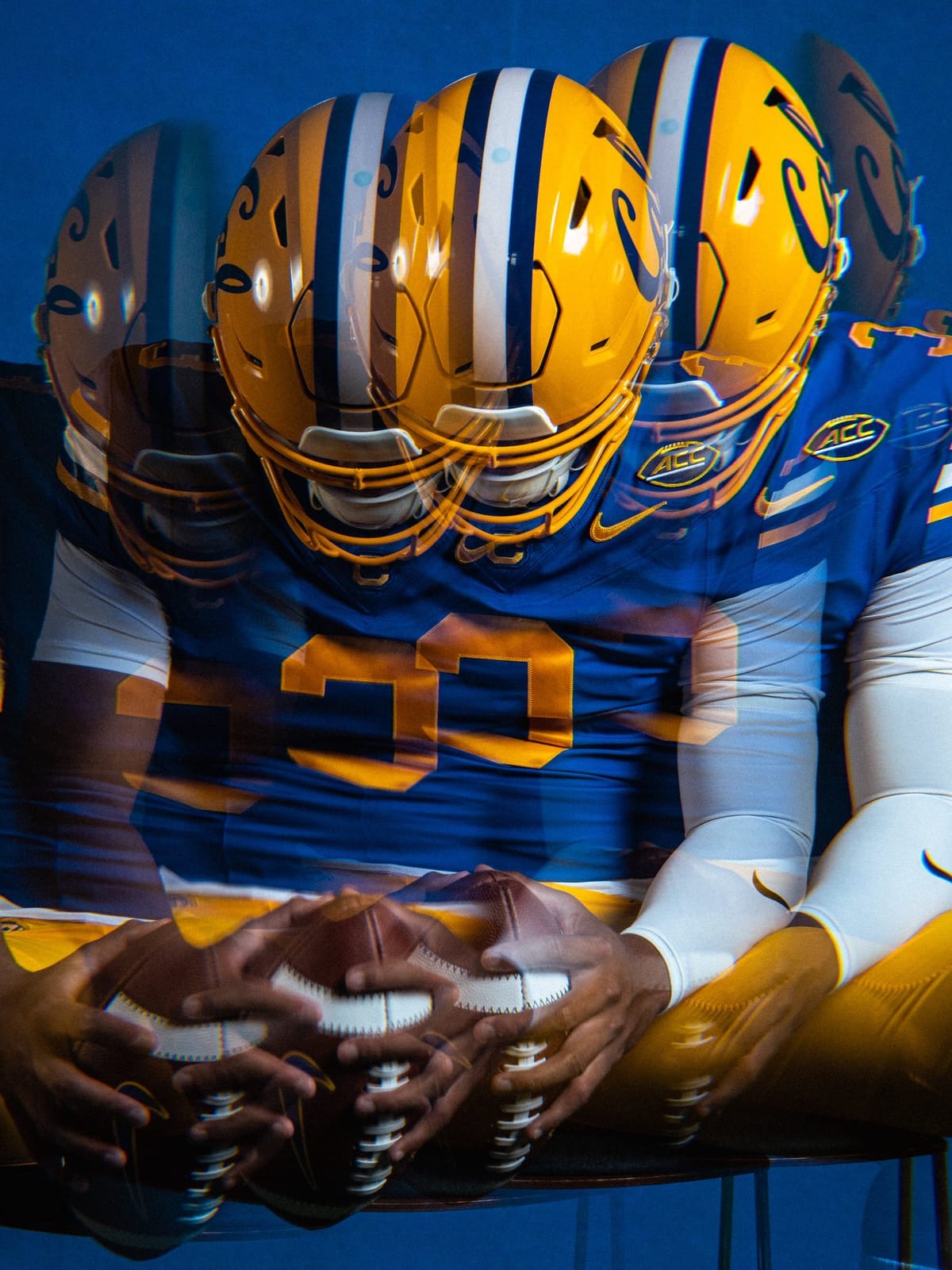 Detail of the Cal Joe Roth throwback uniform showing the gold and white shoulder striping on the royal blue jersey