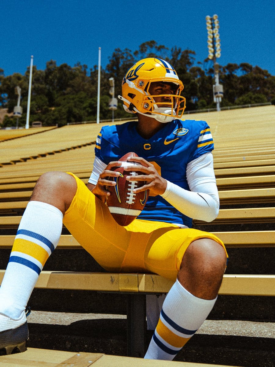 Cal Golden Bears Joe Roth throwback uniform for 2026, with a gold helmet carrying the blue Cal script, a royal blue jersey with gold and white shoulder stripes, gold pants and striped socks