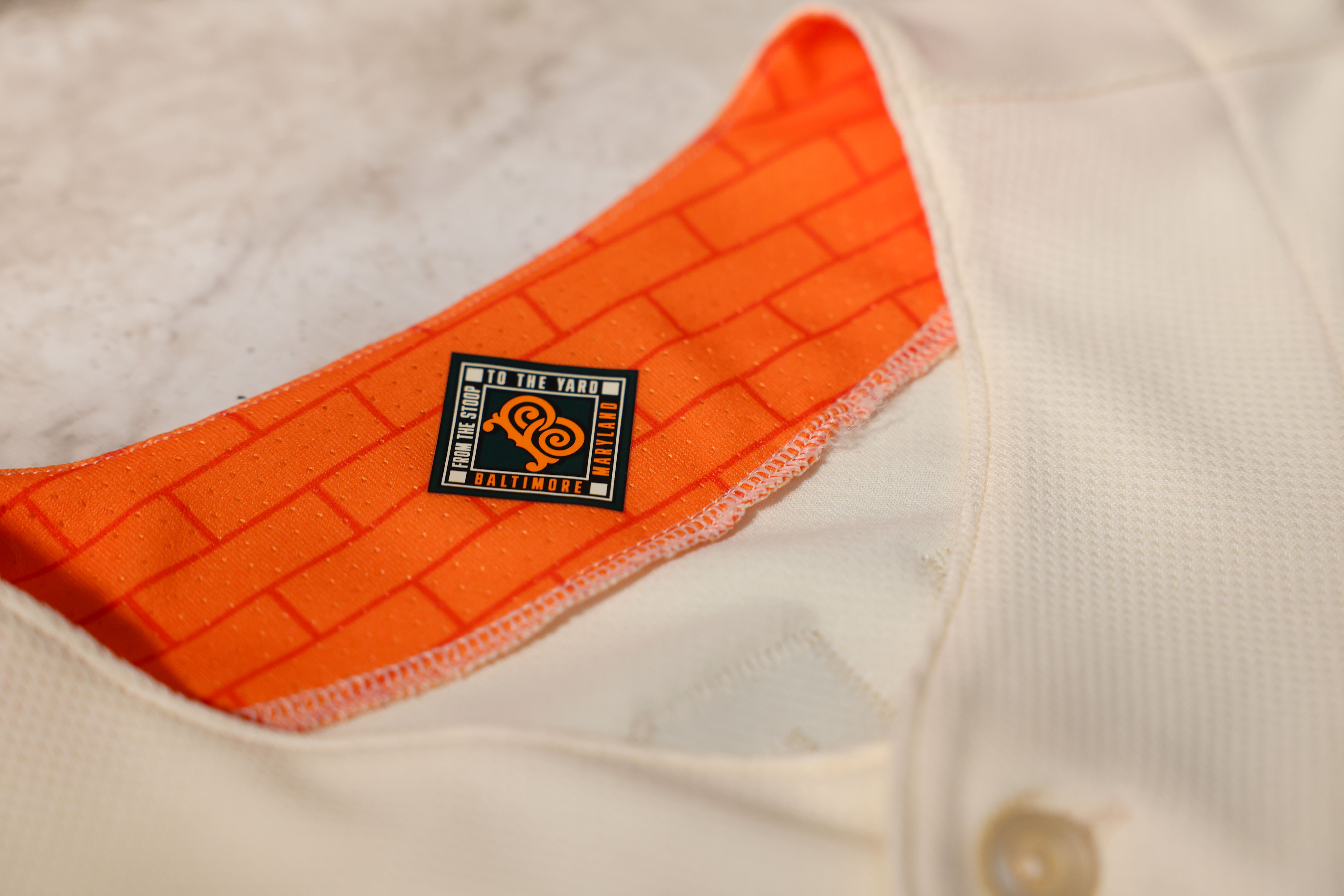 Brickyard pattern collar detail on Orioles 2026 City Connect jersey