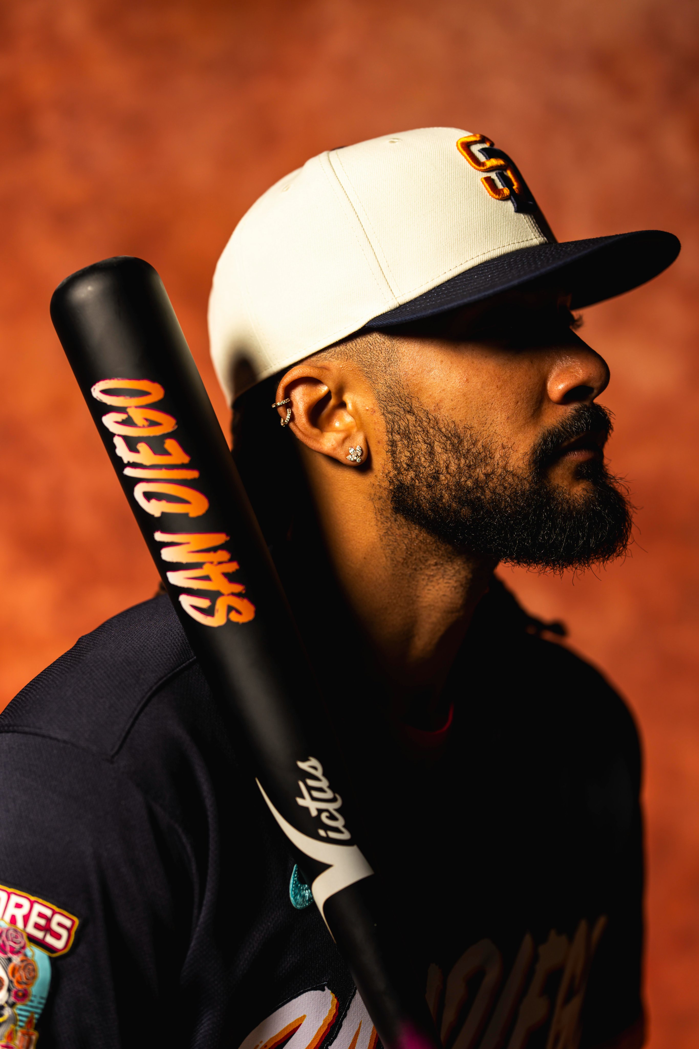 Padres City Connect 2026 player profile shot with bat