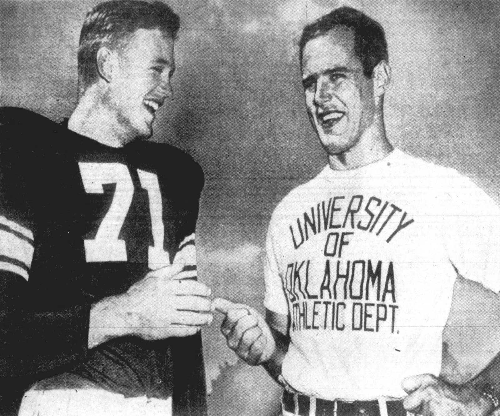 Oklahoma tackle Jim Weatherall in a dark jersey with white numbers and striped sleeves next to coach Bud Wilkinson in 1950