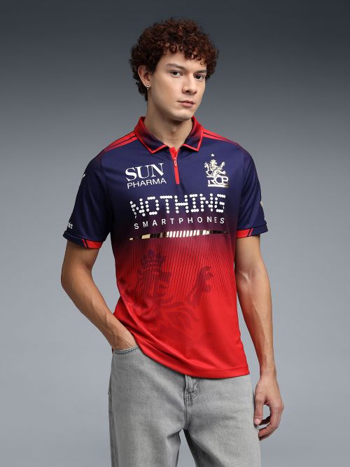 Royal Challengers Bengaluru 2026 IPL home jersey — navy fading to red with the Nothing sponsor