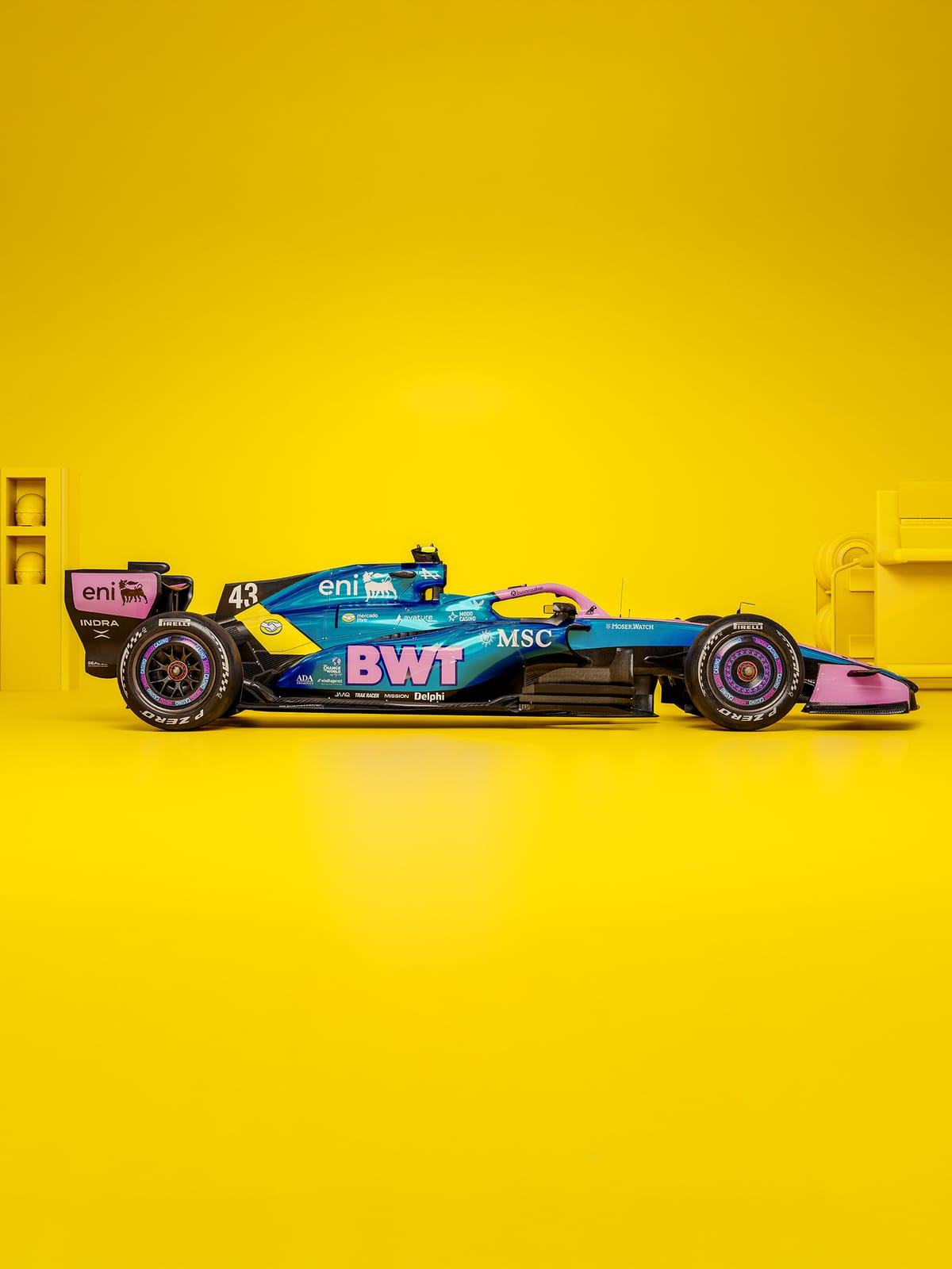 Alpine F1 Miami Grand Prix 2026 Argentinian twist livery side profile of Franco Colapinto's number 43 car shot on a yellow studio background with prominent Mercado Libre BWT eni and MSC sponsor branding