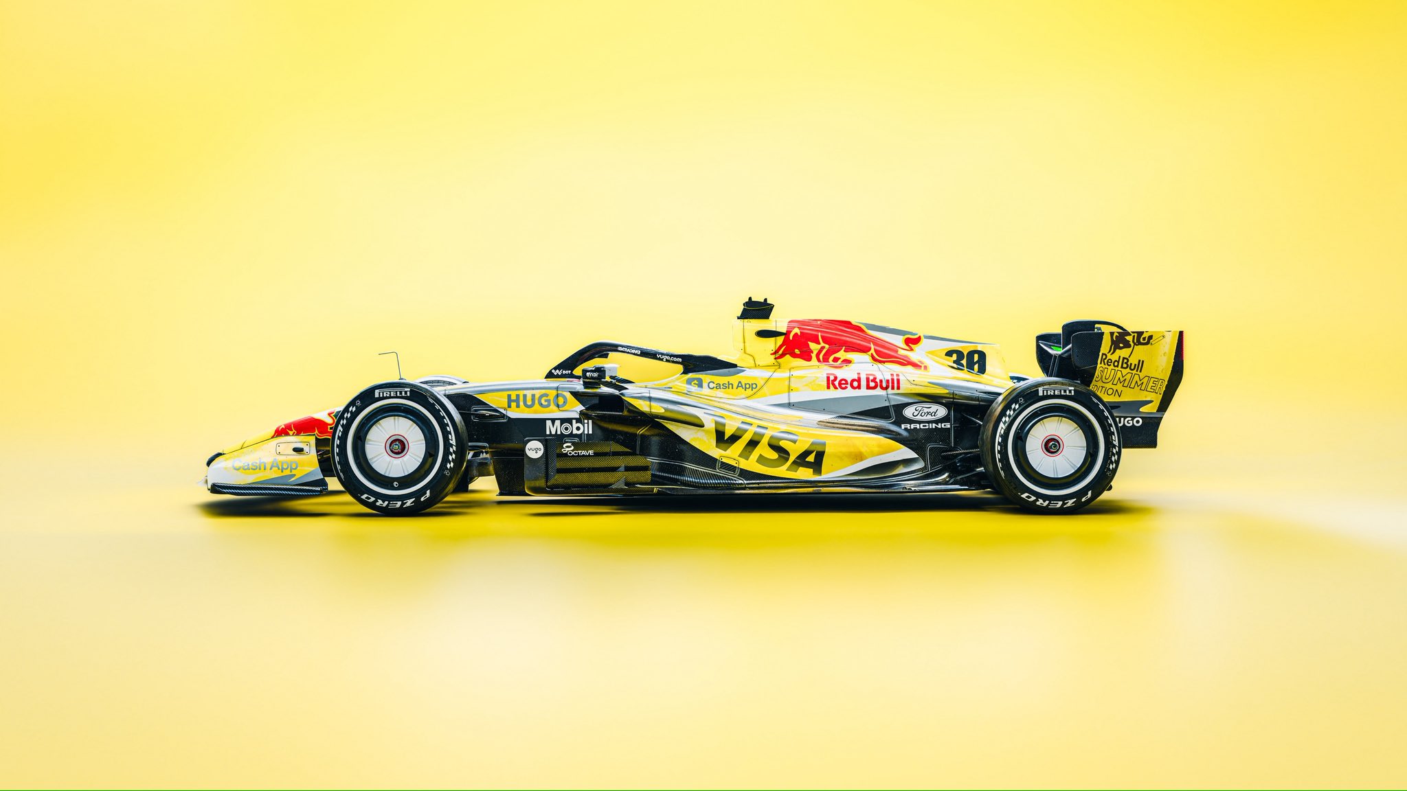 Visa Cash App RB Summer Edition Miami GP 2026 yellow livery side profile of Liam Lawson's number 30 car shot on a yellow studio background with Red Bull Hugo Visa Cash App and Tudor sponsor branding fully repainted in deep summer-sun yellow