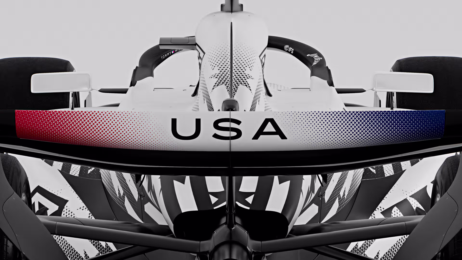 Cadillac F1 Miami Grand Prix 2026 special livery rear wing showing the USA wordmark in red white and blue with subtle red and blue wingtip accents on the MAC-26 chassis