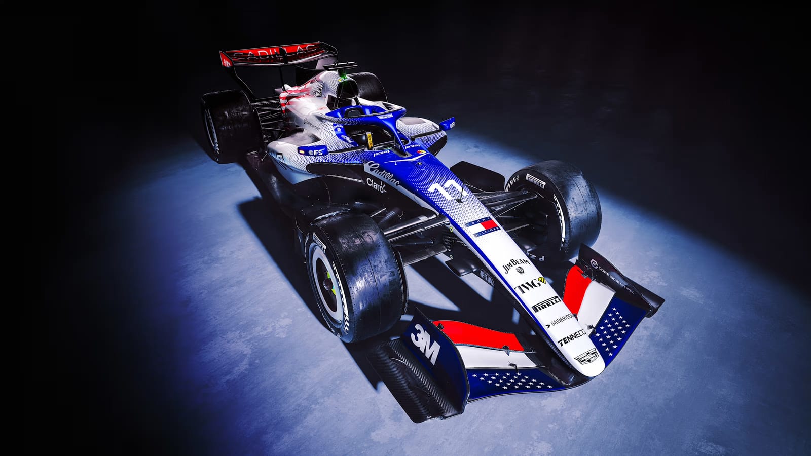 Cadillac F1 2026 British Grand Prix July 4th livery front three-quarter view showing the blue nose, the American flag stars on the front wing, and the white and blue body