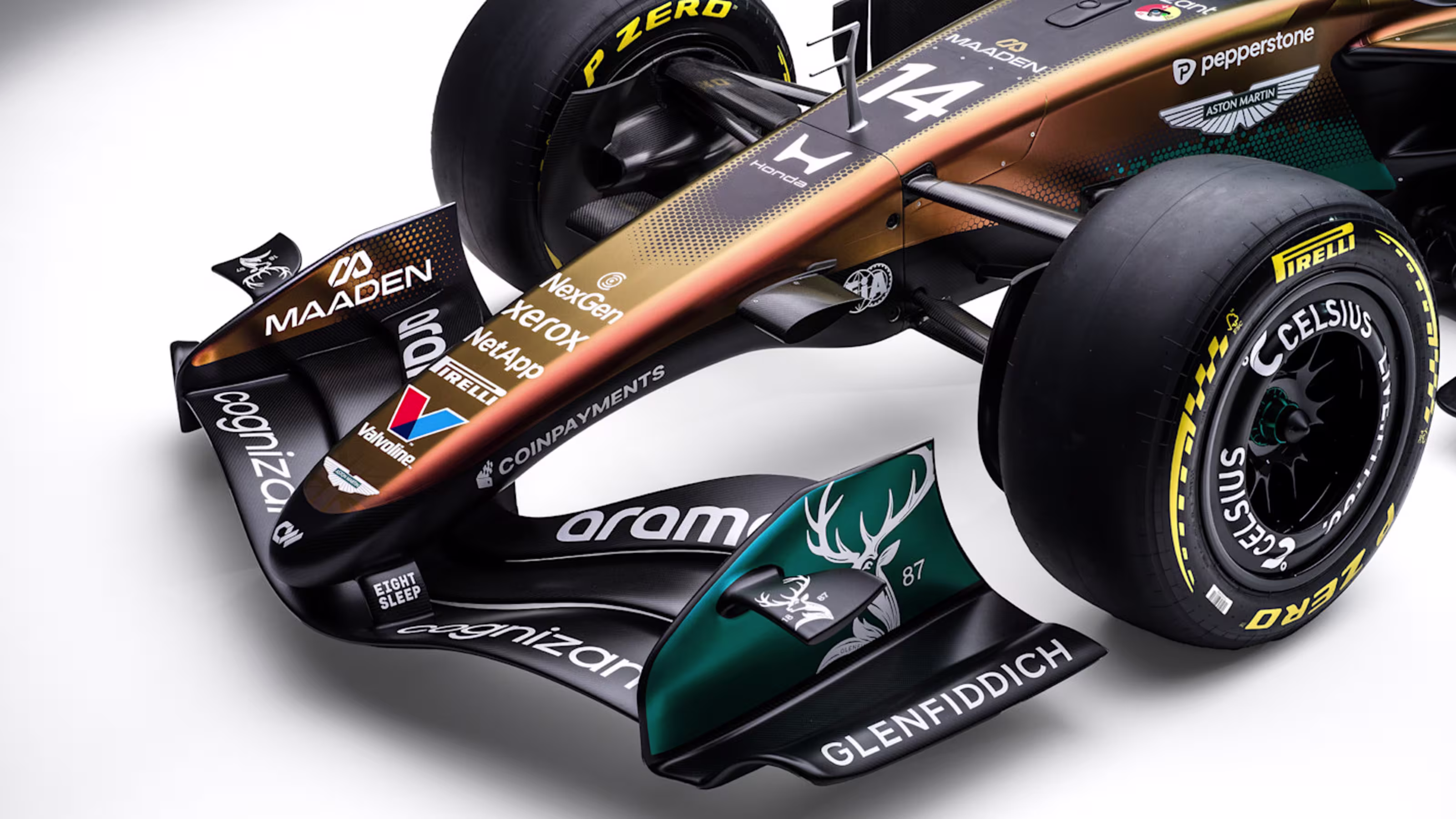 Aston Martin AMR25 F1 Monaco Grand Prix 2026 Maaden iridescent livery alternate main studio photography 28x16 wide format showing additional chassis angles of the color-shifting iridescent paint and the geometric hexagonal mesh design language