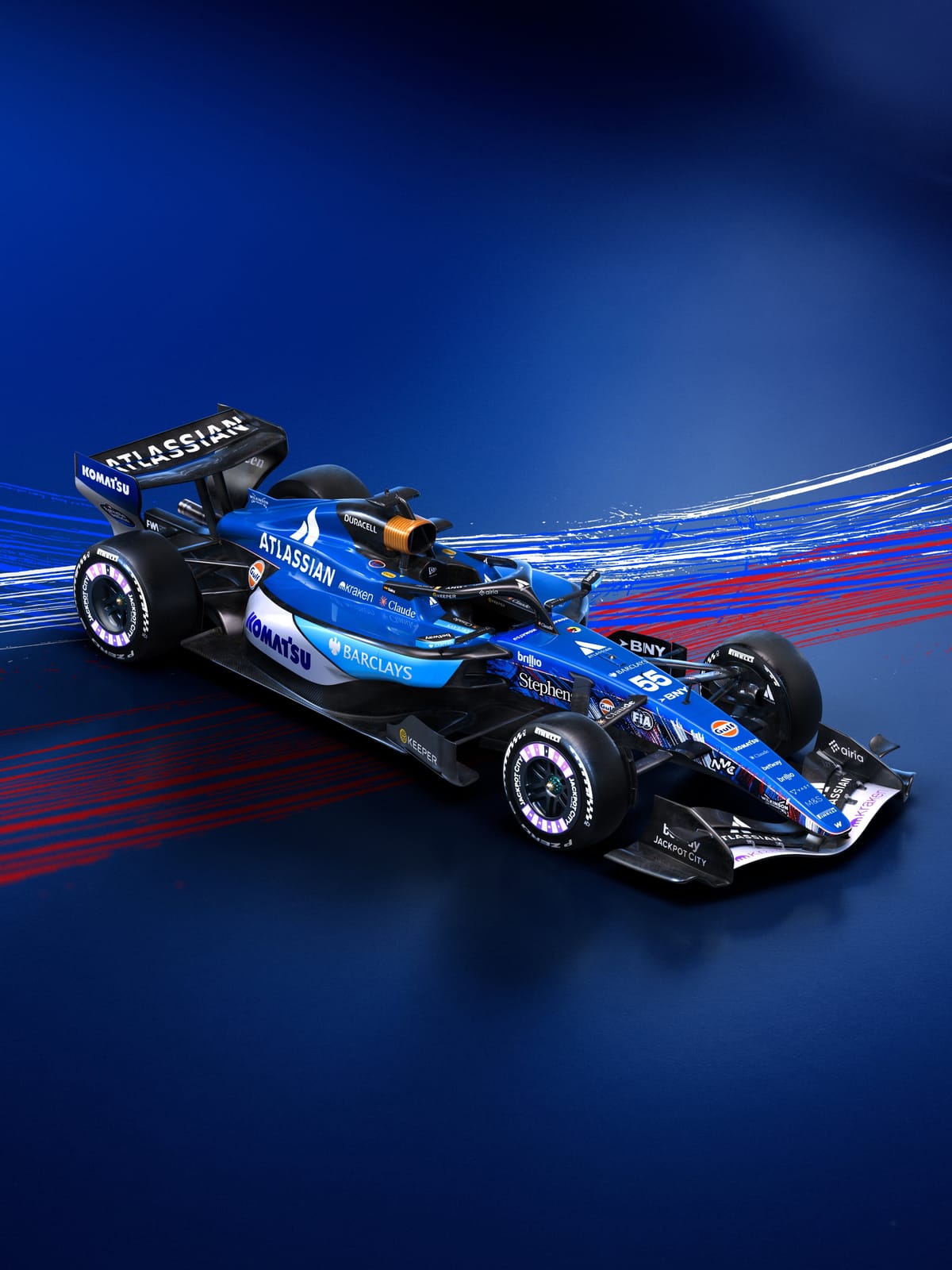 Atlassian Williams F1 2026 British Grand Prix Silverstone livery front three-quarter view of the number 55 car in blue with light-blue Komatsu and Barclays branding