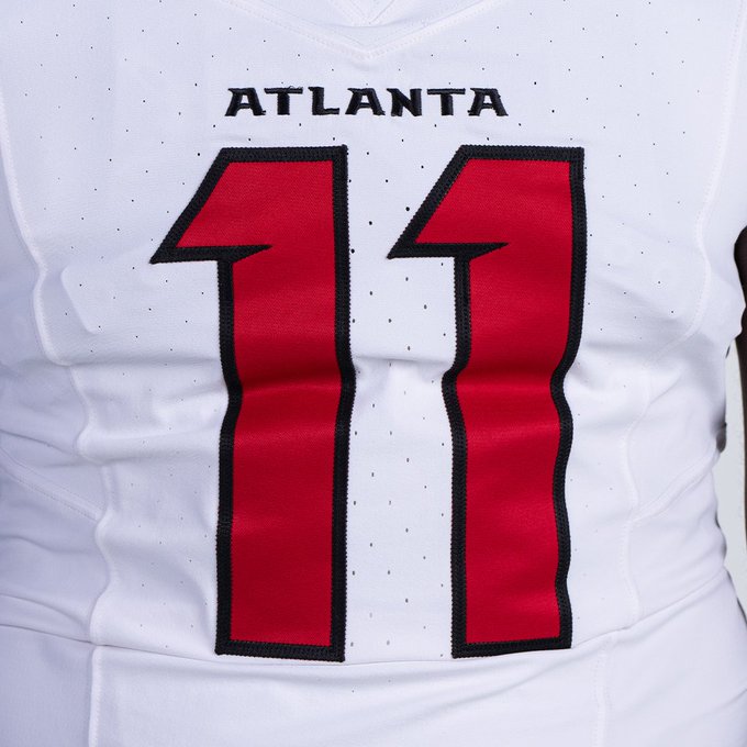 Close-up of Atlanta Falcons 2026 white away jersey number 11 with ATLANTA wordmark