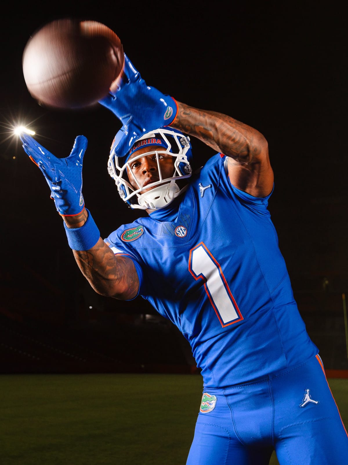 Florida Gators first-ever all-blue uniform, with a blue helmet, blue jersey with white numbers outlined in orange, and blue pants
