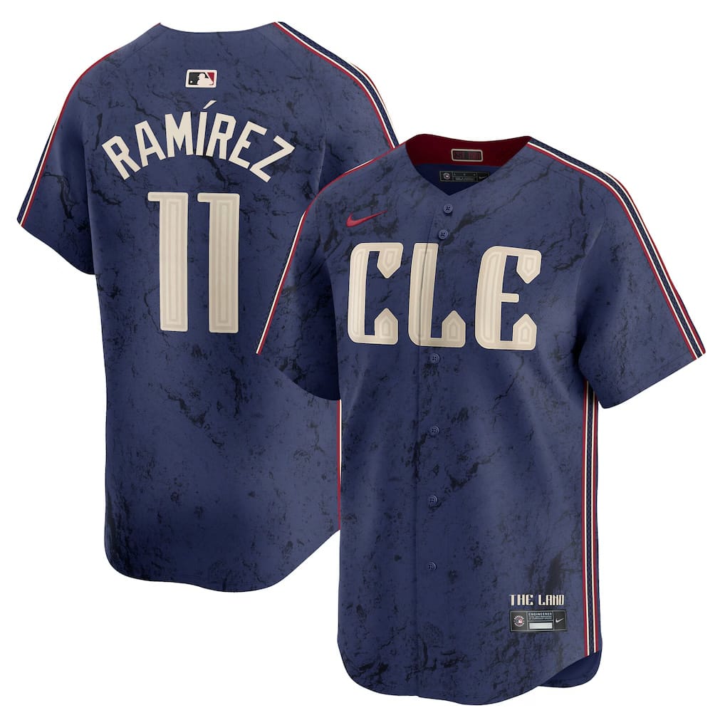 Cleveland Guardians 2026 CLE City Connect jersey by Nike, navy with a stone-texture pattern, cream CLE lettering, and The Land detailing