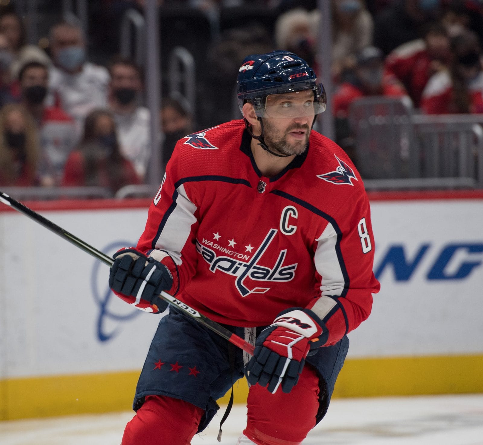 Alex Ovechkin in the Capitals' red home sweater with the Capitals script and three stars across the chest, against the Devils in Washington, January 2, 2022