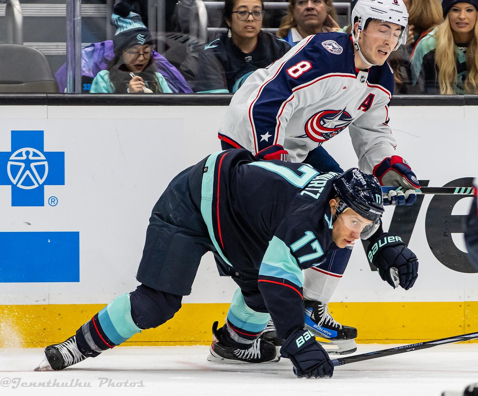 Blue Jackets defenseman Zach Werenski in the white road jersey with the Ohio-flag C and star logo, against the Kraken in Seattle on Jan. 28, 2024