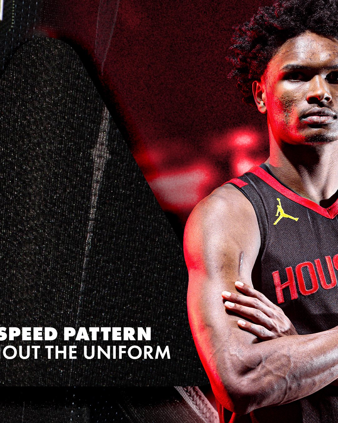 Houston Rockets 2026-27 Statement Edition black jersey player shot showing the Speed Pattern subtle pinstripes throughout, Championship Yellow Jumpman logo, and the red HOUSTON wordmark on the chest
