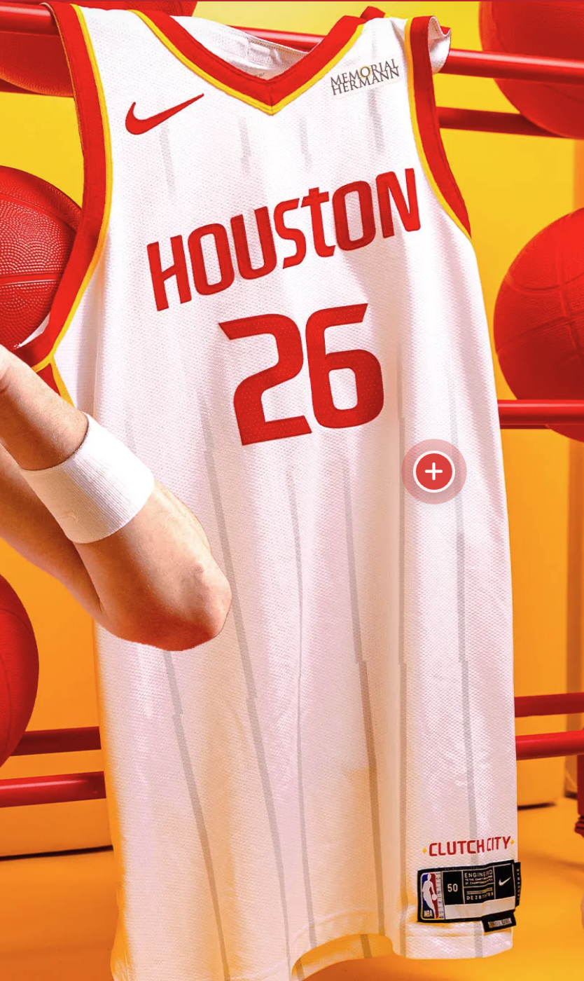 Houston Rockets 2026-27 Association Edition white home jersey product shot on hanger showing the HOUSTON wordmark, number 26, Roll Stripes, Memorial Hermann patch, and Clutch City Forever jock tag