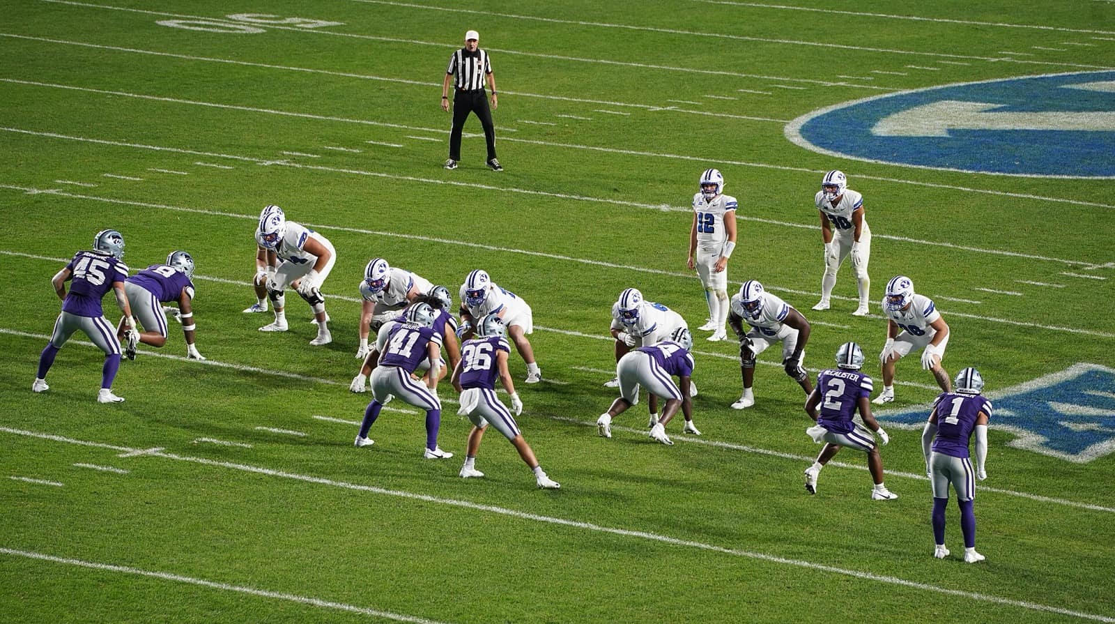 BYU's offense lined up in white jerseys and white helmets against Kansas State at LaVell Edwards Stadium