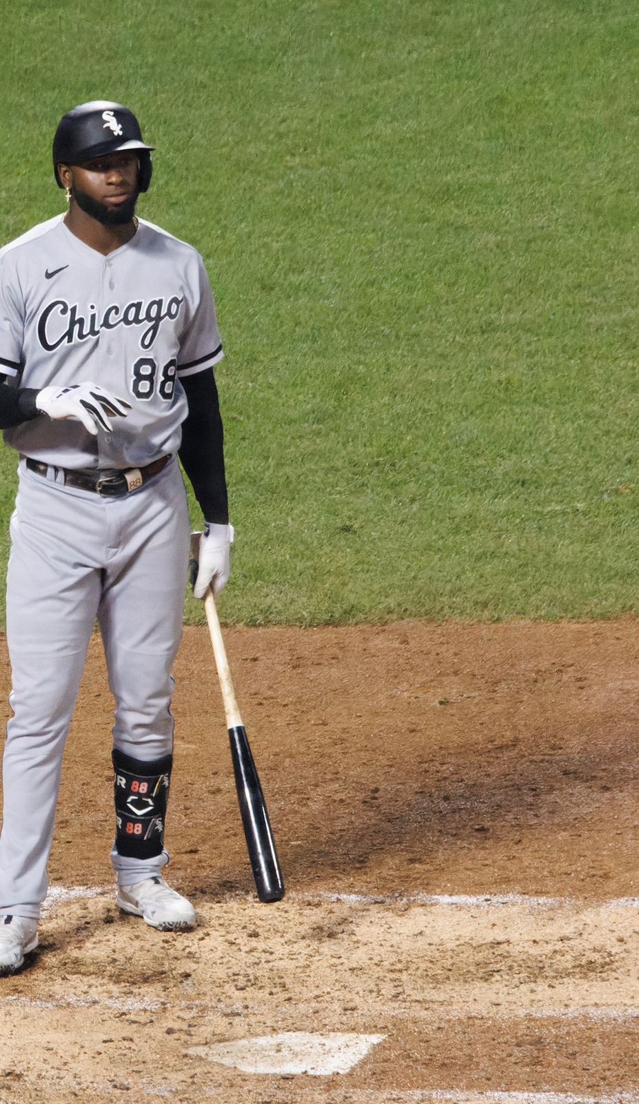 Luis Robert Jr. in the White Sox gray road uniform with black Chicago script