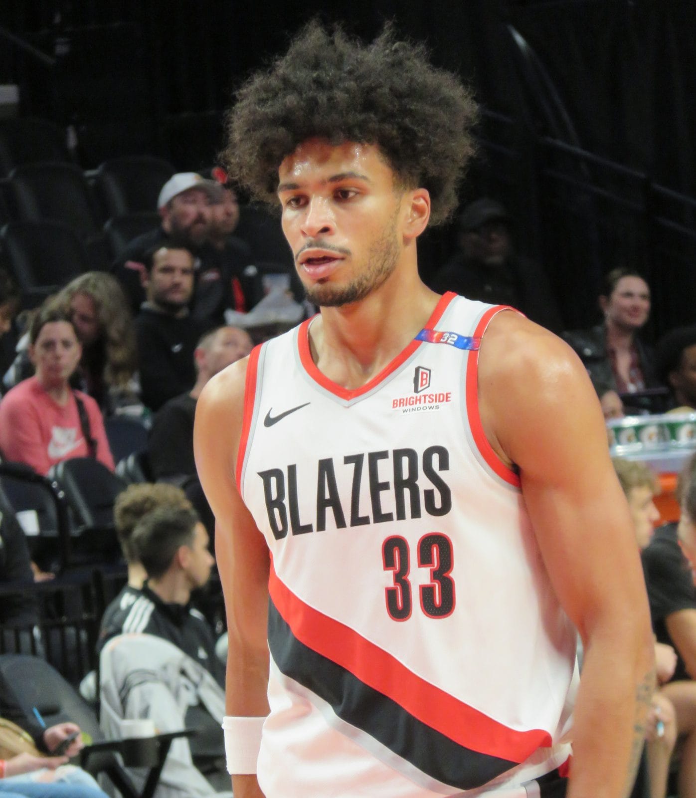 Toumani Camara at the free-throw line in the Trail Blazers' white uniform, BLAZERS over No. 33 with the red-and-black sash, Moda Center, October 16, 2024