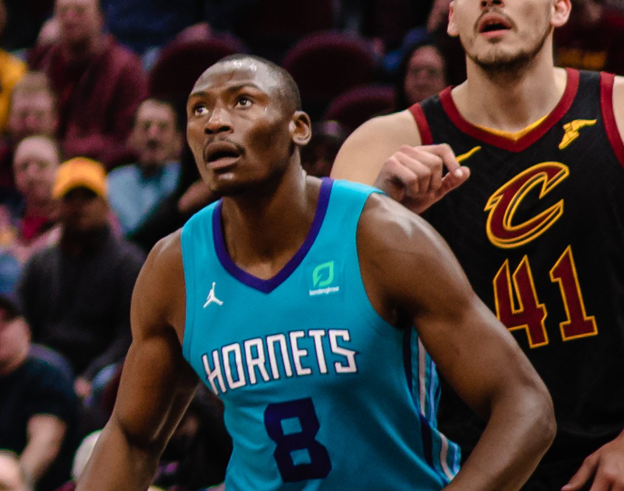 Bismack Biyombo in the Hornets' teal uniform, HORNETS over No. 8, during a game against the Cavaliers in Cleveland, April 9, 2019