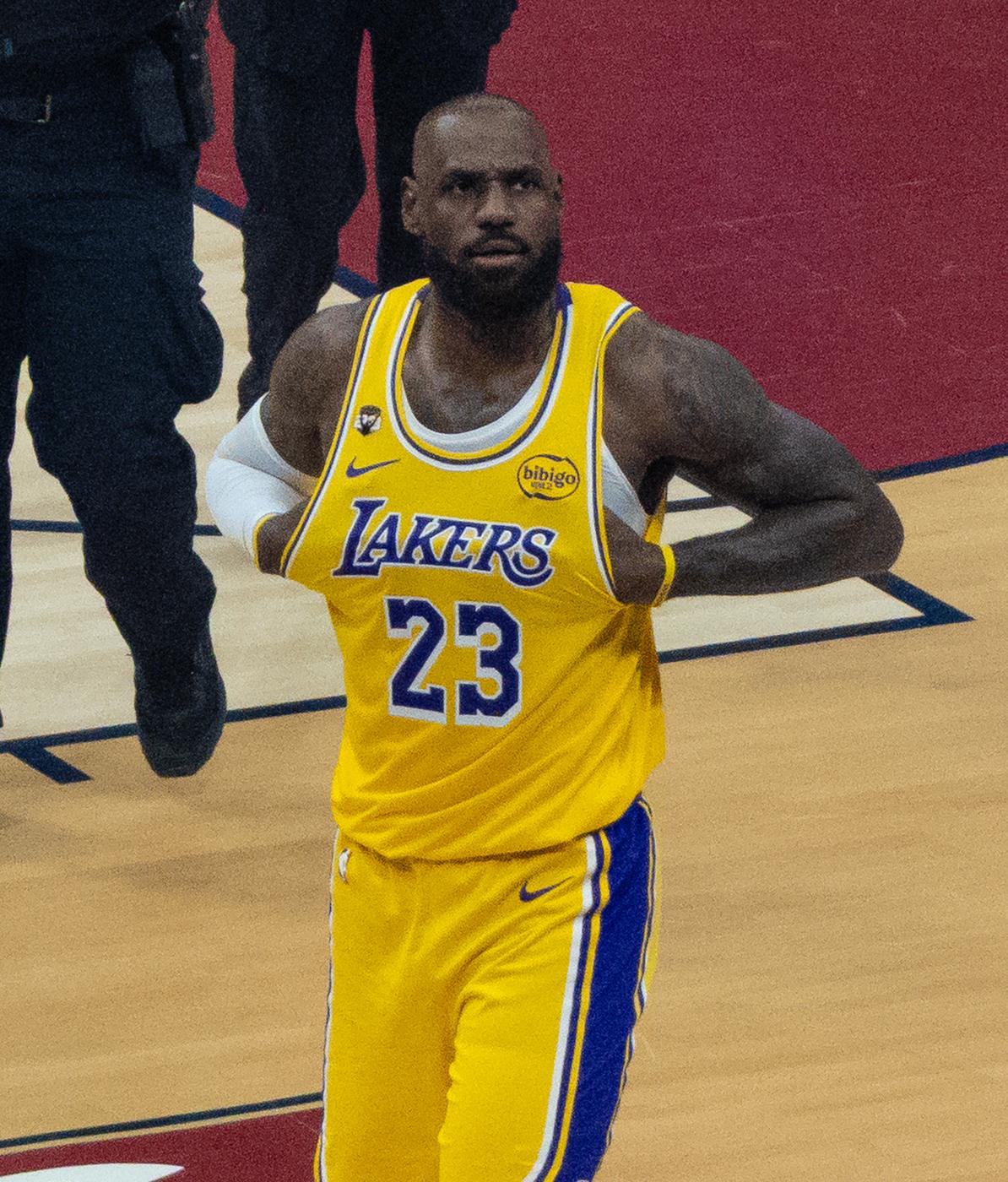 LeBron James in the Lakers' gold uniform, LAKERS in purple over No. 23, at Rocket Mortgage FieldHouse, January 28, 2026