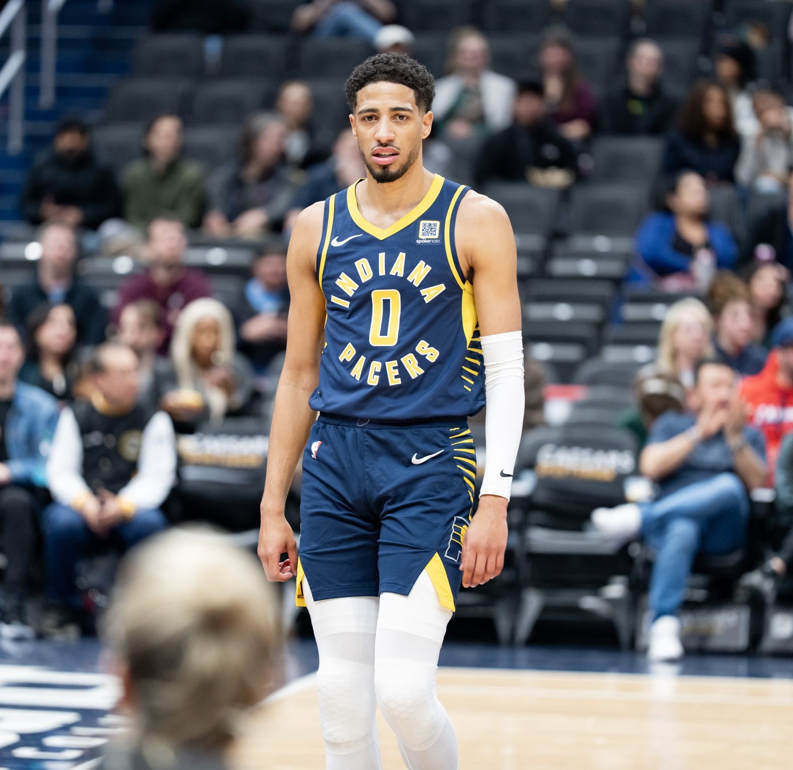 Tyrese Haliburton in the Pacers' navy uniform, INDIANA PACERS in gold over No. 0, at Capital One Arena, March 28, 2025