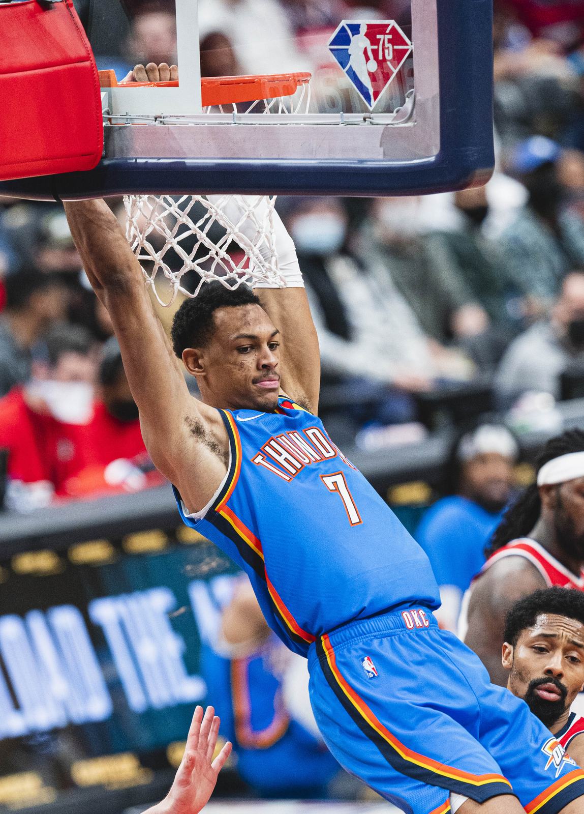 Darius Bazley rises for a dunk in the Thunder's blue uniform, No. 7, at Capital One Arena, January 11, 2022