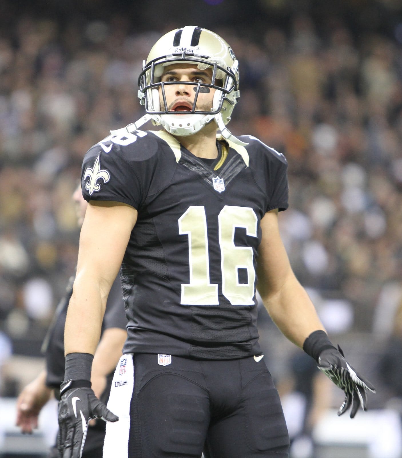 Saints receiver Lance Moore in the black home jersey with old gold numbers, black pants and gold helmet against the Panthers at the Mercedes-Benz Superdome in New Orleans on Dec. 8, 2013