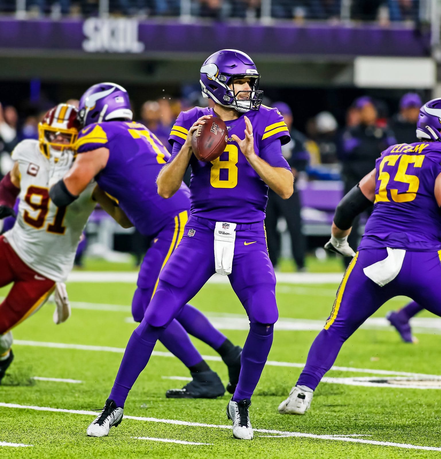 Vikings quarterback Kirk Cousins in the all-purple Color Rush uniform with gold numbers and purple pants, against Washington at U.S. Bank Stadium in Minneapolis on Oct. 24, 2019