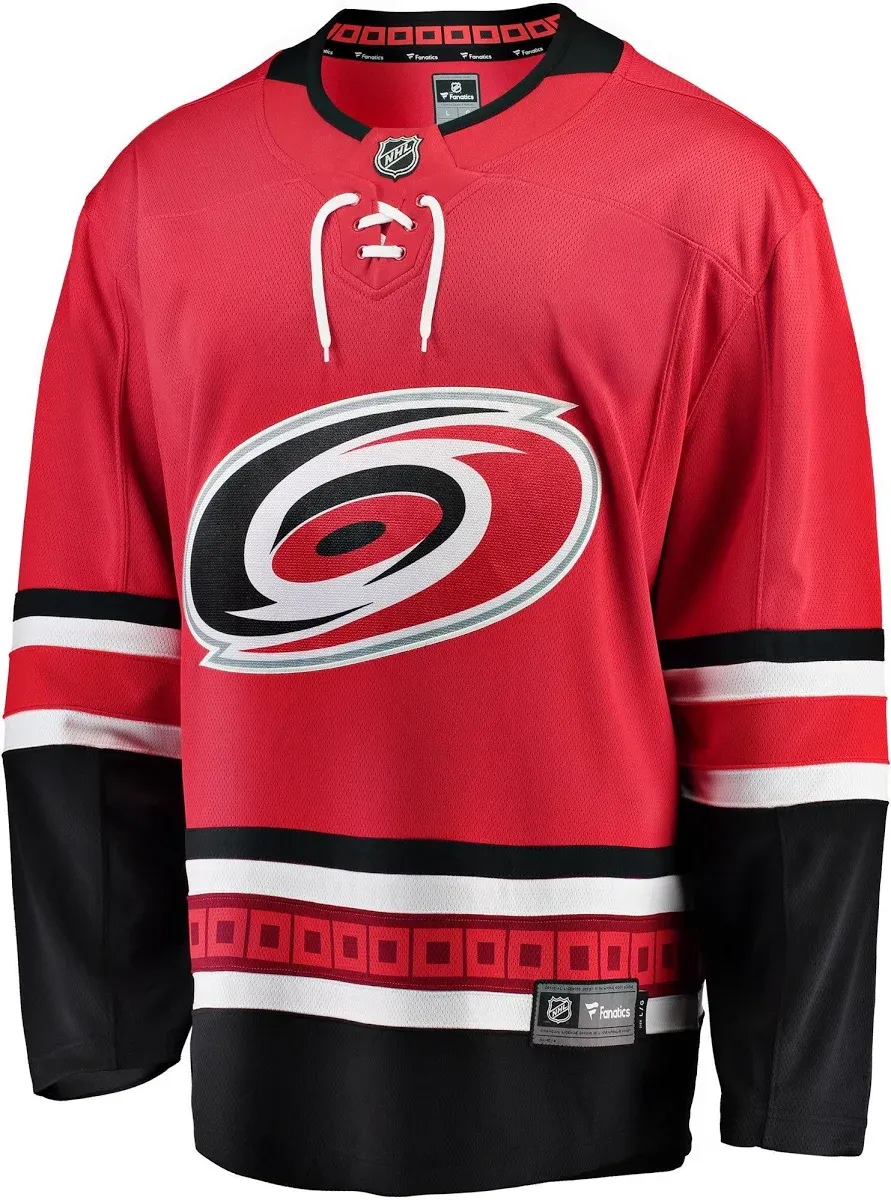 The Carolina Hurricanes iconic red home sweater with the hurricane-warning-flag crest, the sweater the franchise never wore once in the 2026 Stanley Cup Final