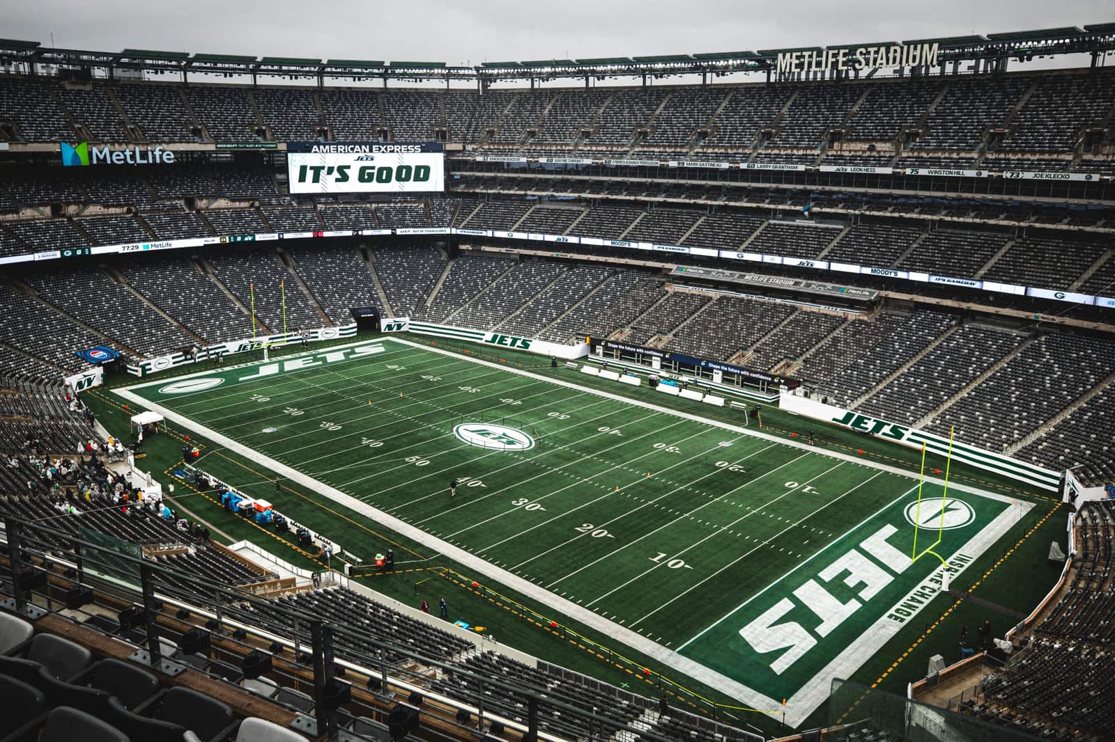 MetLife Stadium set for the Jets' 2026 home opener, with the white oval midfield logo and the current upright JETS wordmark in the end zone