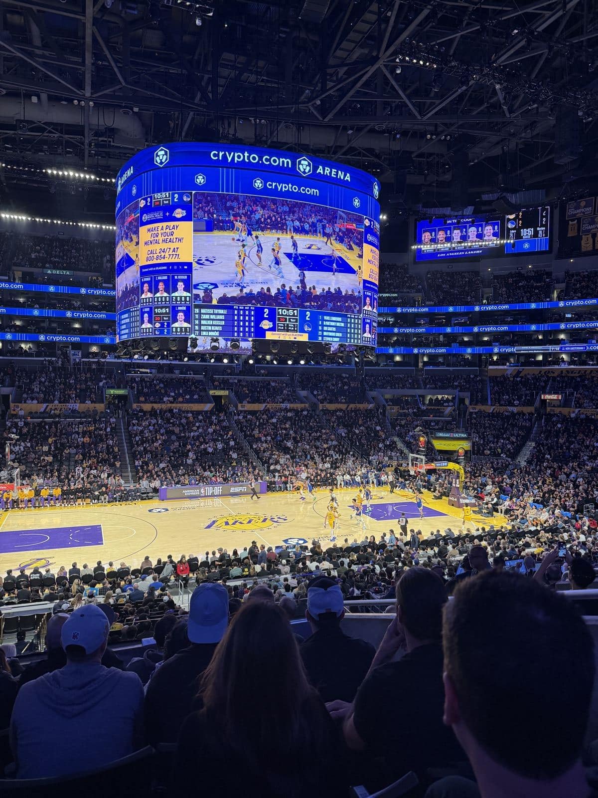 Crypto.com Arena center-hung scoreboard over the Lakers court during the 2026-27 home opener against the Warriors