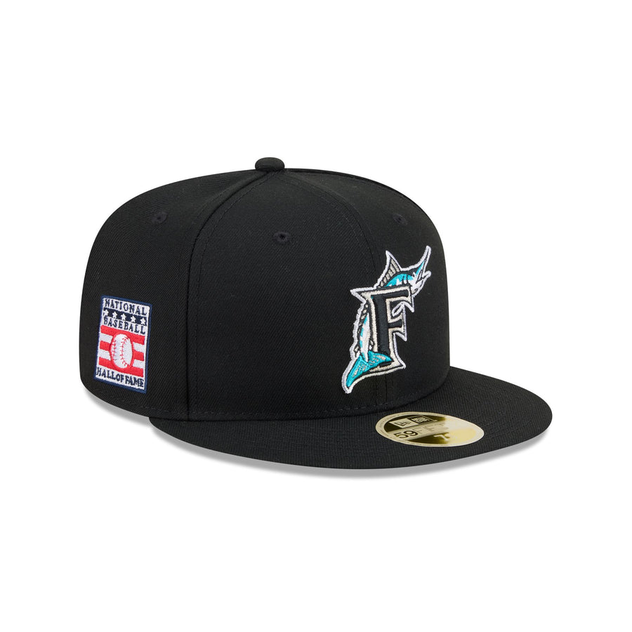 Florida Marlins throwback cap, black crown with the teal marlin swimming through a white F, Hall of Fame side patch