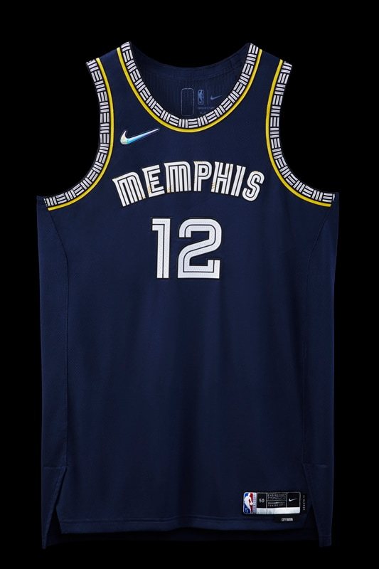 Memphis Grizzlies 2021-22 City Edition jersey, midnight blue with a white MEMPHIS wordmark and gold patterned trim, returning for 2026-27