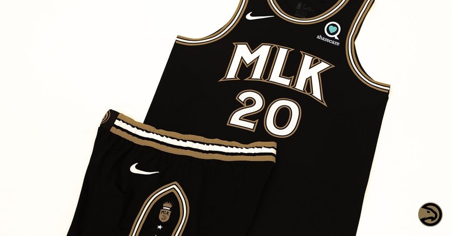 Atlanta Hawks 2020-21 MLK City Edition uniform, black with gold and cream trim and a white MLK wordmark, returning for 2026-27