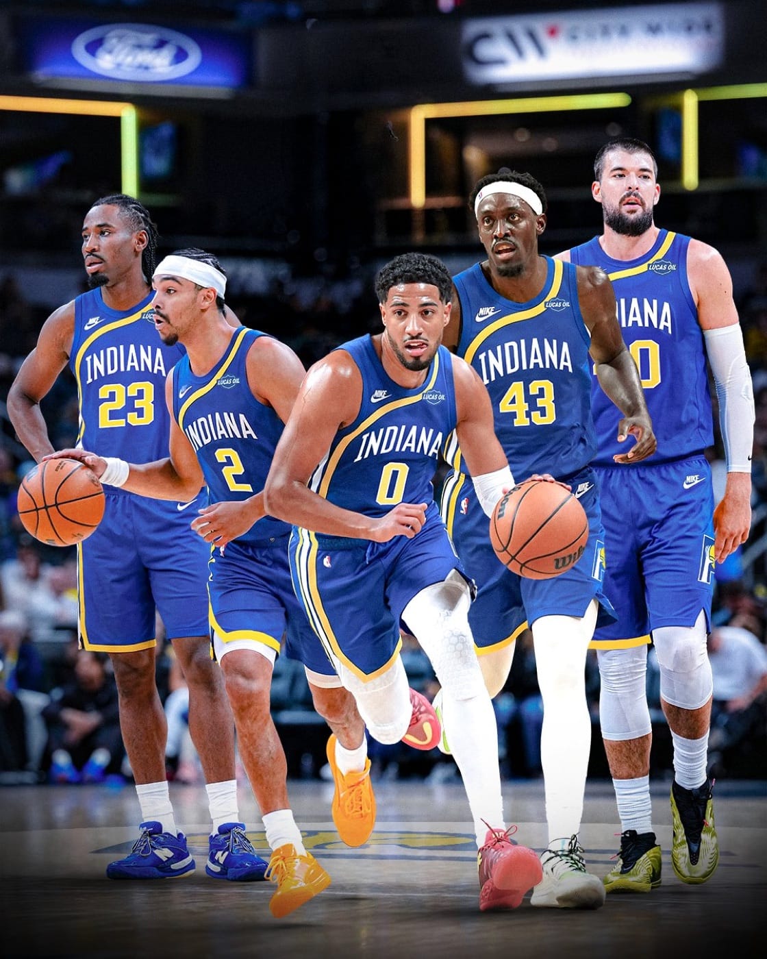 Indiana Pacers players in the blue 2026-27 Classic Threads ABA uniform with an arched INDIANA wordmark and yellow block numbers