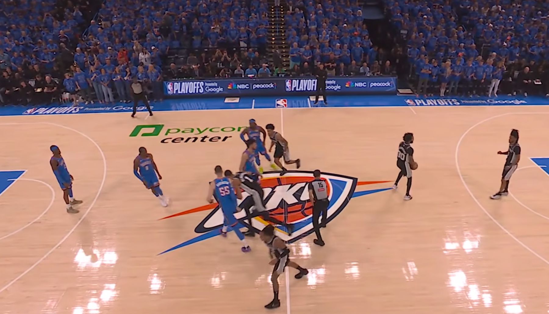 Paycom Center Oklahoma City Thunder home court during the 2026 NBA Western Conference Finals Game 1 vs San Antonio Spurs on NBC with no Western Conference Finals logo painted on the court or apron, only generic NBA Playoffs sponsor lettering