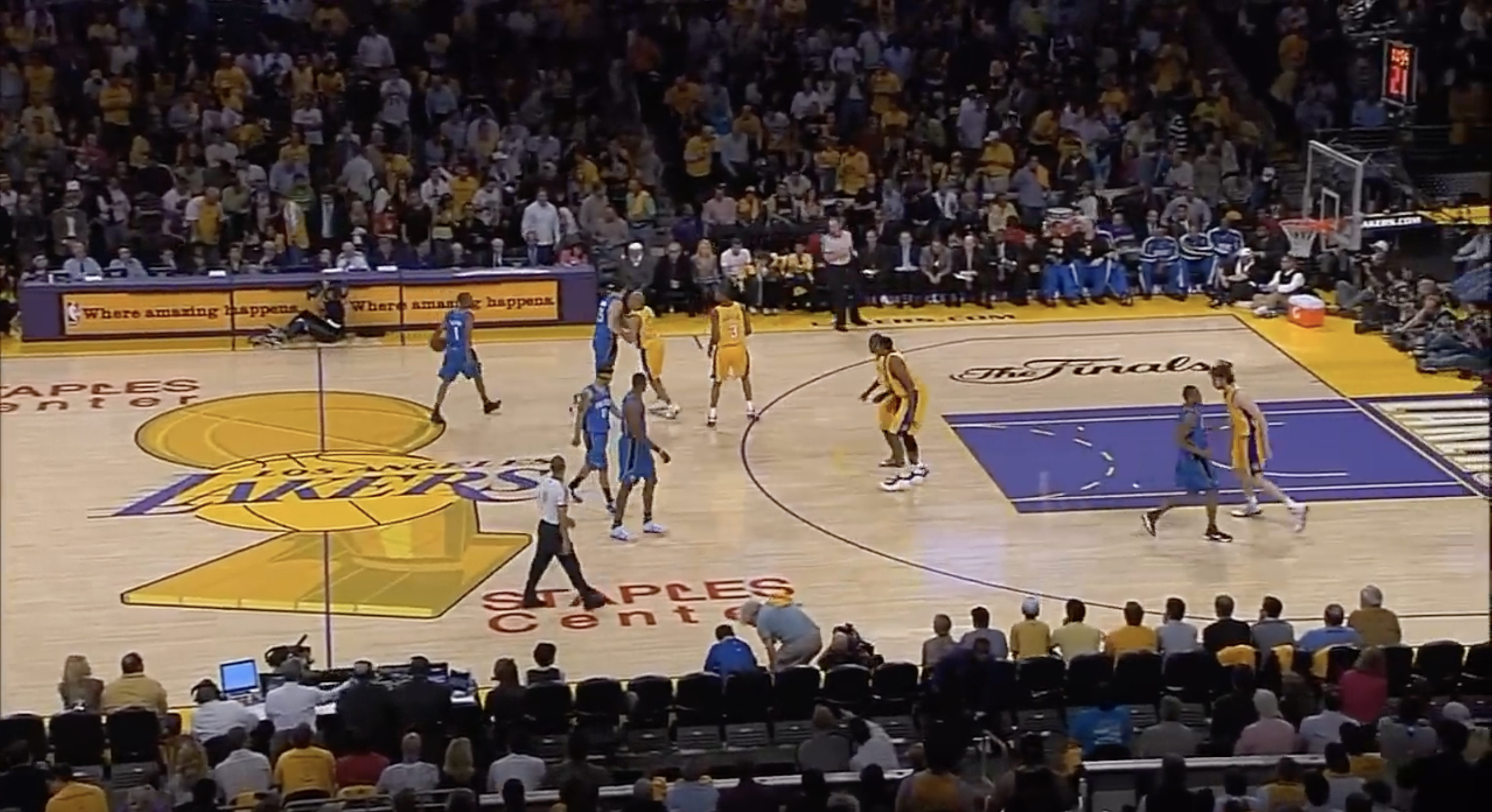 2009 NBA Finals at Staples Center, Los Angeles Lakers vs Orlando Magic with Larry O'Brien Trophy painted at center court and The Finals cursive script logo on the floor, the last year the trophy was painted on an NBA Finals court before the 2026 return