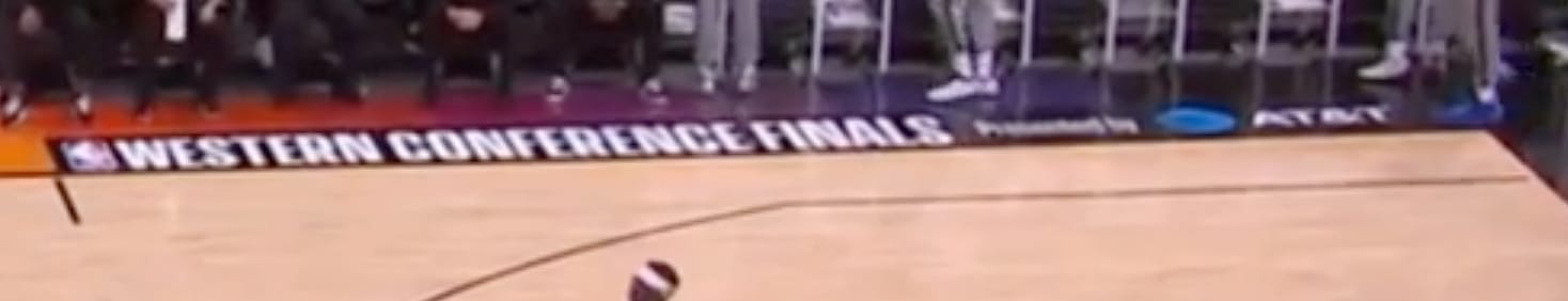 2021 NBA Western Conference Finals court apron with the painted Western Conference Finals wordmark next to the AT&T sponsor logo, the on-court playoff branding the NBA used to run before removing it from Conference Finals courts