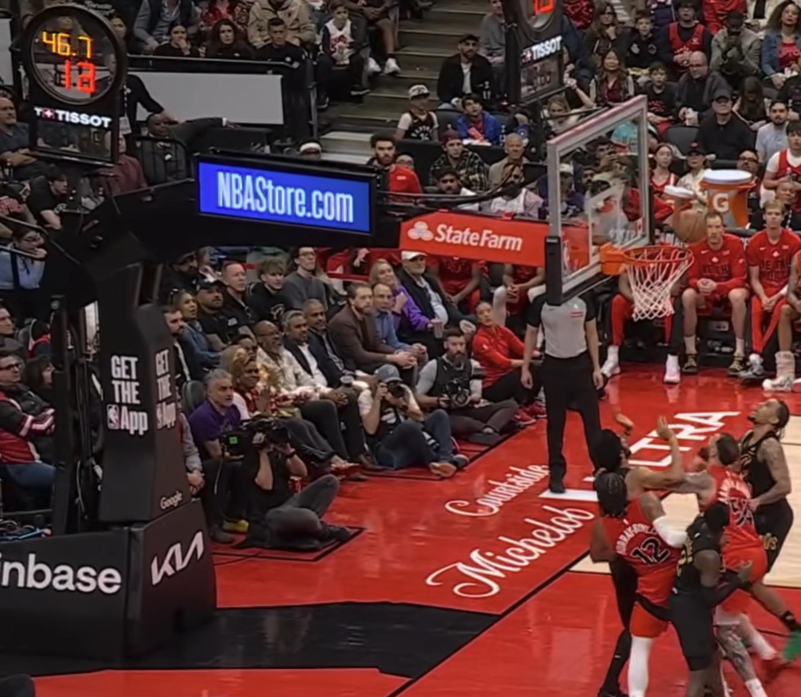 Cavaliers at Raptors stanchion at Scotiabank Arena 2026 NBA Playoffs Round 1 Game 4 with no Playoffs logo branding