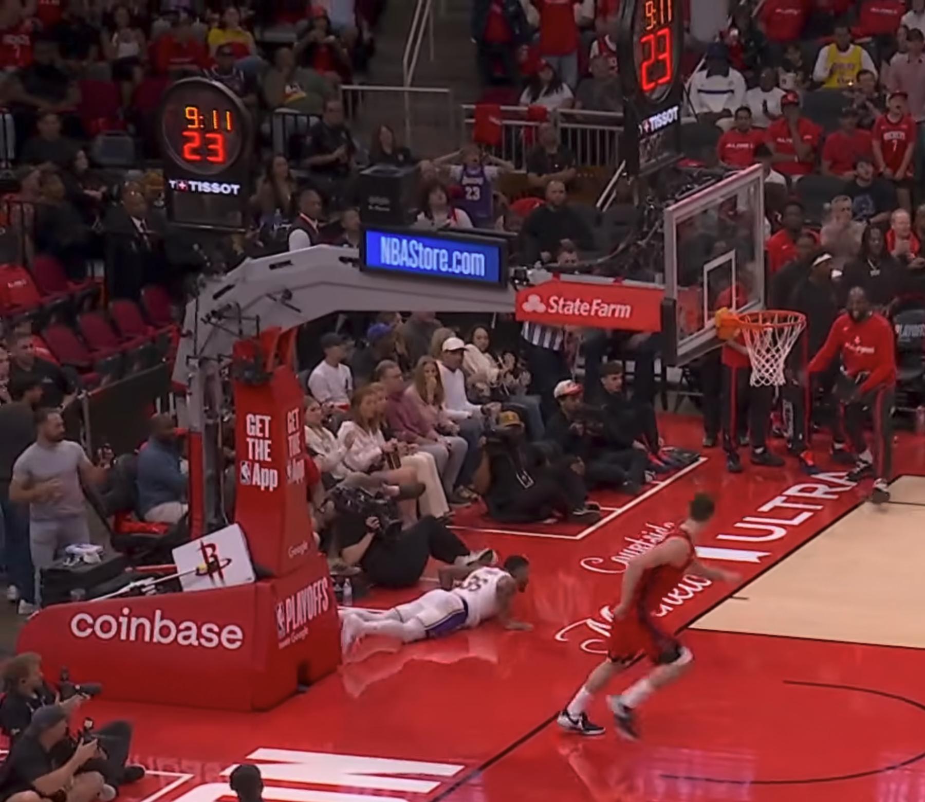 NBA Playoffs logo on the stanchion under the basket at Toyota Center during Lakers at Rockets 2026 NBA Playoffs Round 1 Game 4