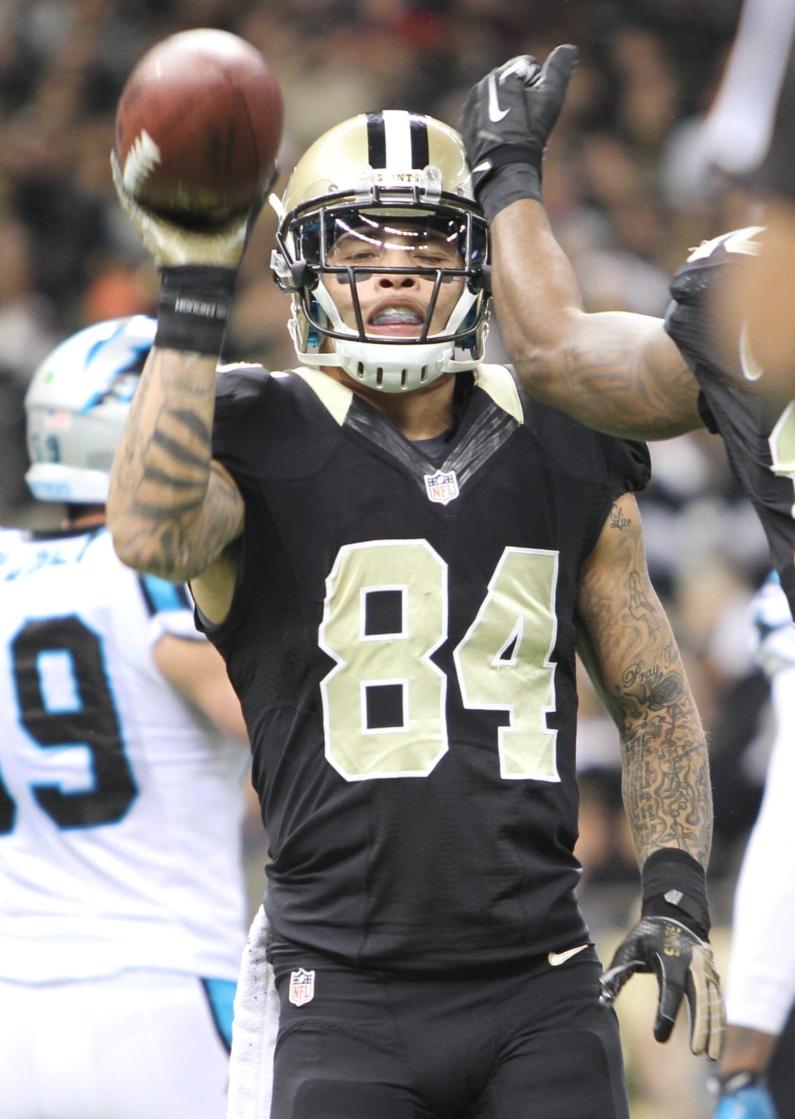 New Orleans Saints wide receiver in the black home jersey and gold helmet at the Superdome