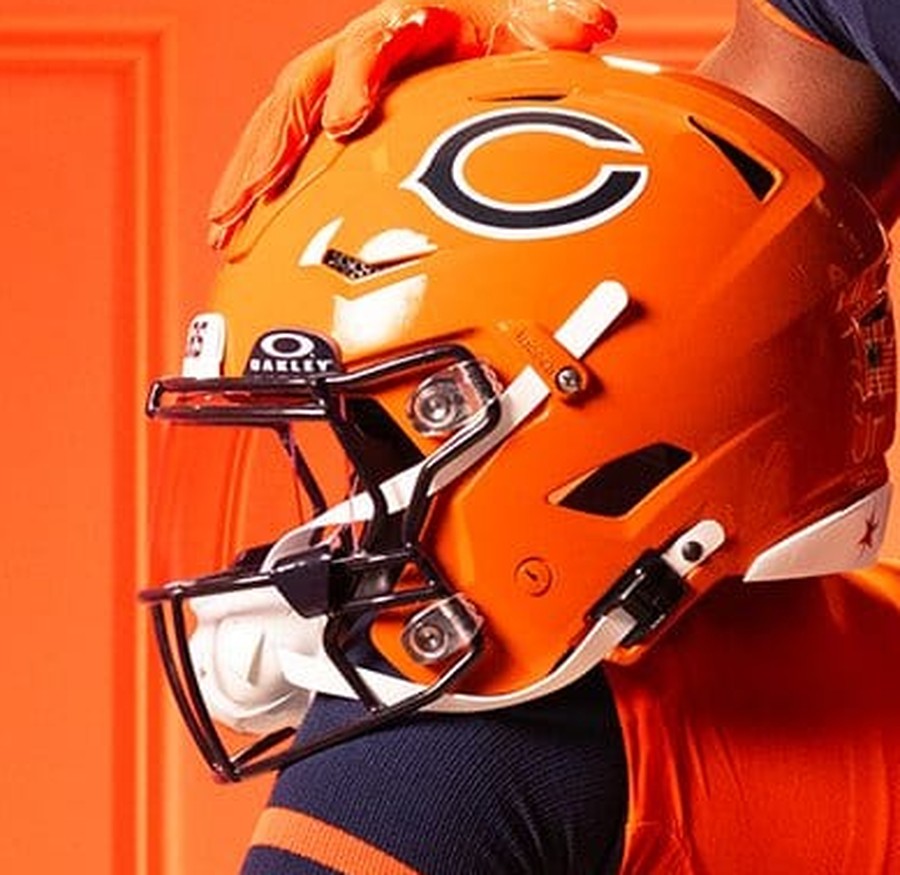 Chicago Bears Rivalries helmet, the burnt orange shell with the navy wishbone C, a revamped classic BEARS wordmark on the bumper, and the four stars of the Chicago flag